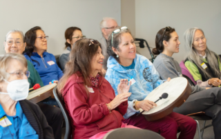 Playing music at a Music Centered Wellness social activity